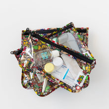 Load image into Gallery viewer, Bumkins Clear Travel Bag 3-Pack: Super Mario™ Mashup lays stacked on a white background, filled with TSA-compliant bottles and toiletries.