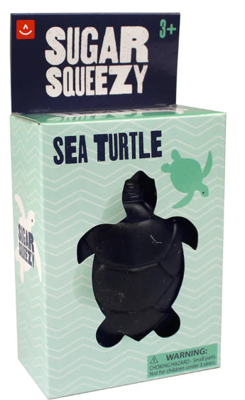 Aurora Sugar Squeezy Sea Turtle squishy toy, ages 3+, mint green box, cute turtle art, stress relief, includes warning label.
