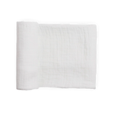 A white Little Unicorn Organic Cotton Muslin Swaddle Blanket is folded flat against a plain white background.