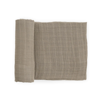 Little Unicorn Organic Cotton Muslin Swaddle Blanket in Driftwood, OEKO-TEX certified, pictured rolled and unrolled on white.