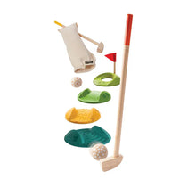 Load image into Gallery viewer, PlanToys Mini Golf Set: 1 wooden kids club, 3 balls, wavy greens, red flag & bag. Eco-friendly fun for budding golfers!.