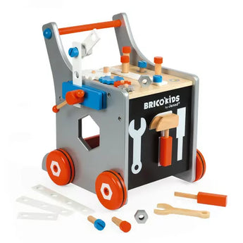 Janod Juratoys DIY Magnetic Trolley featuring a wooden tool bench with magnetic tools, gears, and construction pieces.