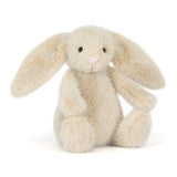 Jellycat Flufflet Bunny Wheat: a cream plush bunny with long ears and pink nose, sitting upright.