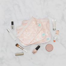 Load image into Gallery viewer, Bumkins Clear Travel Bag 3-Pack: Lace lays stacked on a marble background surrounded by makeup items.
