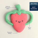 The Itzy Ritzy Chew Crew Strawberry teether, BPA free with a smiling face and textured bottom, is perfect for soothing sore gums.