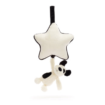 Jellycat Musical Pull Black & Cream Puppy with star, black hanging strap—a sweet lullaby accessory for little ones.