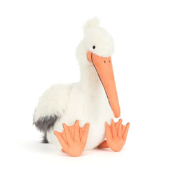 Jellycat, Keli Pelican—with an orange beak and fluffy white body—is ready to make a splash as your next cuddly companion!.