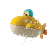 Load image into Gallery viewer, PlanToys Wooden Submarine Bath Toy in yellow and blue, with a propeller and cute face, glistens with water droplets.
