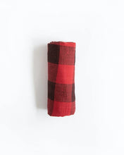Load image into Gallery viewer, A folded Little Unicorn Red Plaid Cotton Swaddle on a plain white background.