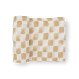 Little Unicorn Cotton Swaddle, Adobe Checker: white muslin with hand-painted style brown grid squares, perfect for baby.
