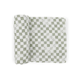 Little Unicorn Organic Cotton Muslin Swaddle in Green Checker, GOTS certified, features subtle textured details.