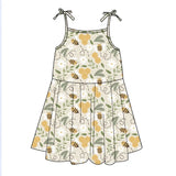 Illustration of Emerson and Friends Sundress in Happy Honey Bees pattern with green, white, gold tones and bow straps.