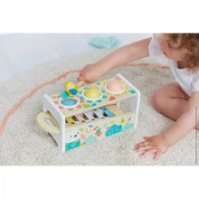 Load image into Gallery viewer, A child enjoys tapping a Janod Juratoys Wooden Xylophone on a colorful circular rug.