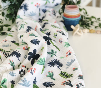 Pick a Nursery Theme Using Your Favorite Swaddle Like This...