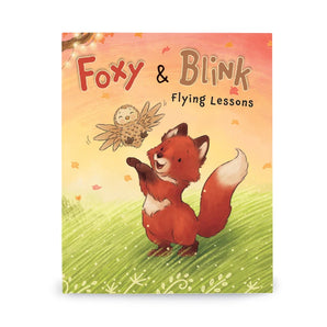 Cover of Foxy & Blink Flying Lesson Hardcover Book with an owl and fox illustration.