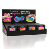 Showcase Crunch & Squish Candy fidget busters: fun, crunchy sensory toys in colorful display box and candy-themed packaging.