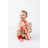 Load image into Gallery viewer, Toddler in Emerson and Friends Sleeper, Here For the Snacks beams, clutching a striped snack bag against a plain backdrop.

