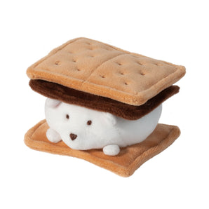 S'more Bear Macaroon: white bear stuffed animal in between two tan cracker-shaped pieces and a dark brown rectangle.