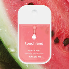 Load image into Gallery viewer, Hydrating Hand Sanitizer: pink sanitizer bottle with white cap &amp; text "touchland Power Mist Hydrating hand sanitizer" on a watermelon slice.
