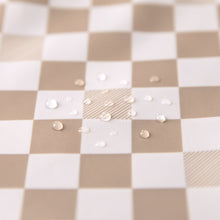 Load image into Gallery viewer, Close-up of water droplets on a Bumkins SuperBib® 3 Pack: Palms + Check.
