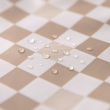Load image into Gallery viewer, Close-up of water droplets on a Roamio by Bumkins Clear Travel Bag 3 Pack: Sand Check.
