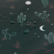 Load image into Gallery viewer, Close-up of water droplets on Bumkins Wet Bag: Starry Cactus.
