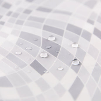 Close-up of water droplets on a Roamio by Bumkins Reusable Snack Bag, Large 2 Pack: Disco Boots.