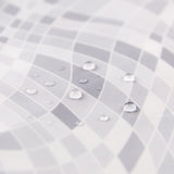 Close-up of water droplets on Roamio by Bumkins Wet/Dry Clutch: Disco Check.