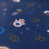 Close-up of water droplets on Bumkins Wet/Dry Clutch: Evil Eye.