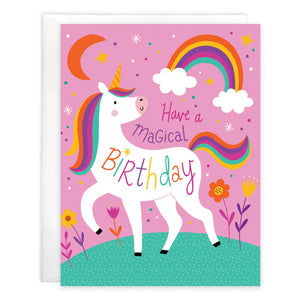 Birthday Card, Magical Unicorn: card with unicorn, rainbow, and flower illustrations with text "Have a Magical Birthday," and white envelope.