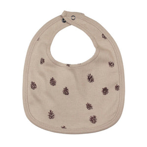 Organic Reversible Bib: tan bib with pinecone pattern and snap closure.
