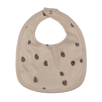 Organic Reversible Bib: tan bib with pinecone pattern and snap closure.