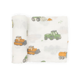Little Unicorn Cotton Swaddle, Work Trucks: soft muslin blanket with green and orange trucks—breathable comfort for your baby.