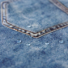 Load image into Gallery viewer, Close-up of water droplets on Bumkins Sleeved Bib: Vintage Denim.
