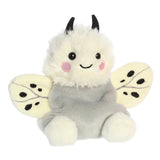 Palm Pals, Astra Moth by Aurora is a plush with fluffy white fur, black antennae, spotted wings, and a smiling face.