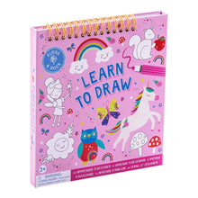 Load image into Gallery viewer, Floss and Rocks Learn to Draw, Rainbow Fairy book has a spiral binding and eco-friendly cover with unicorns, fairies, and rainbows.
