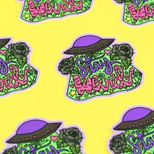 Load image into Gallery viewer, Turtle Soups Vinyl Sticker: An alien in a purple hat, green roses, and Stay Weird on yellow—fun, colorful, and weatherproof!.
