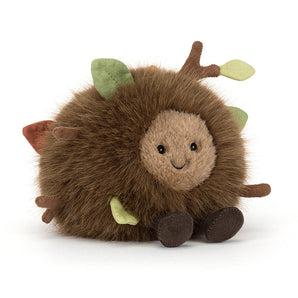 Jellycat Amuseables Mulshi Woodland Floor: a round, fluffy, brown plush toy with a smiling face and soft leaves.