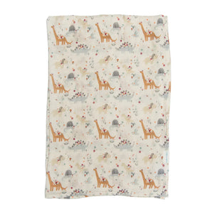 The LouLou Lollipop Muslin Swaddle, Baby Dinomite features giraffes, birds, and flowers on a light bamboo muslin fabric.