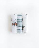Little Unicorns Cotton Swaddle Set includes three blankets with bison, geometric patterns, and turtle prints on a white background.