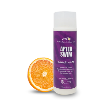 Vita C After Swim Conditioner, a chlorine neutralizer, is shown beside a sliced orange on a white background.