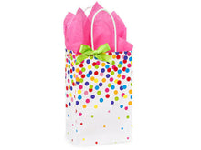 Load image into Gallery viewer, Gift wrapping by Zoolikins | Childrens Boutique features multicolored dots, a green bow, and pink tissue paper—ideal for cheerful cards.
