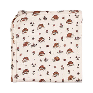 Organic Blanket, Tiny Tortoise: cream blanket with tortoise and flower pattern.