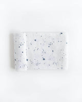 Little Unicorn Cotton Swaddle, Shooting Stars: soft, breathable muslin with blue stars on white—perfect comfort for babies.