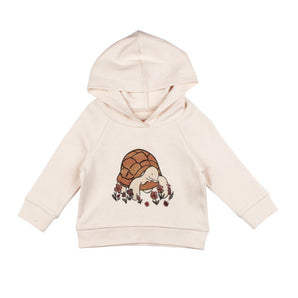 Front view of Organic Hoodie, Tiny Tortoise: beige raglan hoodie made of 100% cotton with a tortoise illustration.