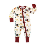 Sleeper, On the Farm: beige long sleeve pajamas with farm animal, barn, & tractor print, red cuffs, & front zipper; made of bamboo viscose.