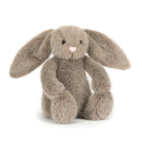 Jellycat Flufflet Bunny Fawn sits upright, floppy-eared with black eyes and a pink nose, ready for Flufflet Street Theater.