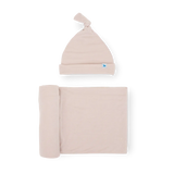 The Soft Knit Swaddle and Hat Set in Soft Blush by Little Unicorn makes the perfect newborn gift.