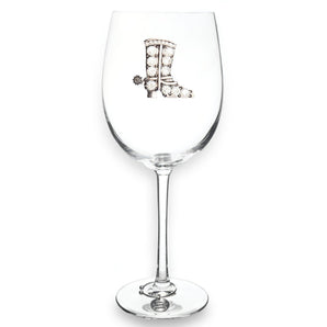 The Queen Jewels Stemmed Wine Glass features a vintage cowboy boot with a spur, packaged elegantly for gifting.