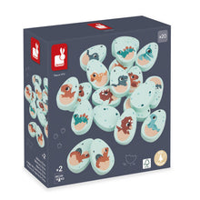 Load image into Gallery viewer, The Dino Memory Game by Janod Juratoys features dinosaur eggs with hatchlings, perfect for preschoolers 2+ to explore a prehistoric adventure.
